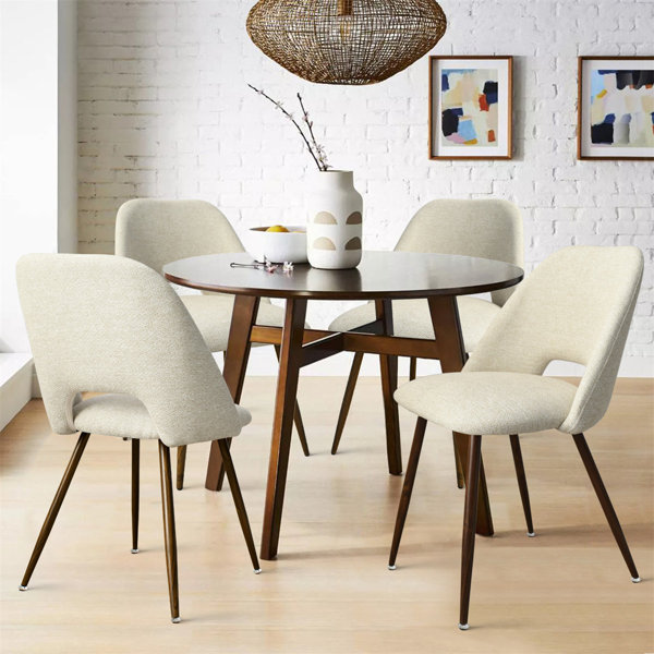 Upholstered dining chairs with walnut legs discount